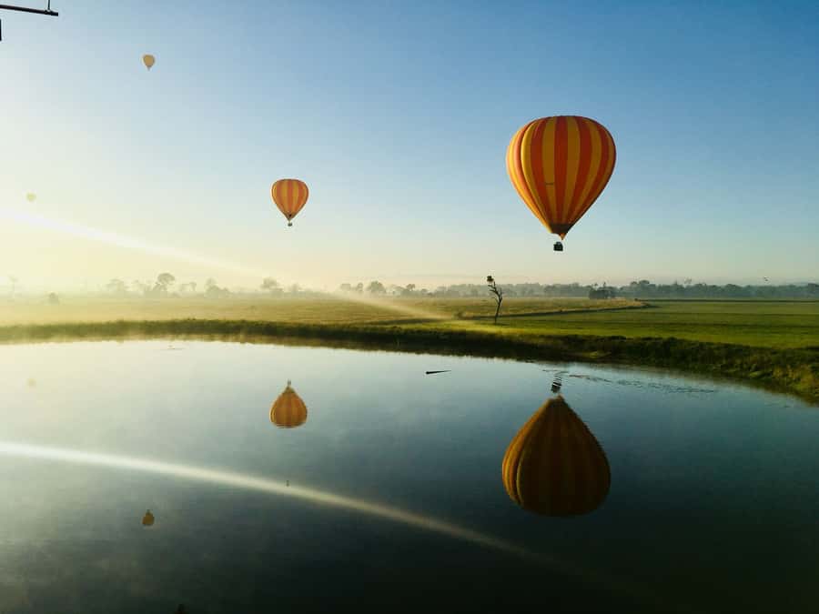 Brisbane: Hot Air Balloon Flight with Vineyard Breakfast - Landing, laughter, and folding the balloon