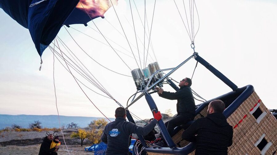 Cappadocia: Balloon Sunrise Flight Economic-Premium Options - Watching the balloons prepare in the dark