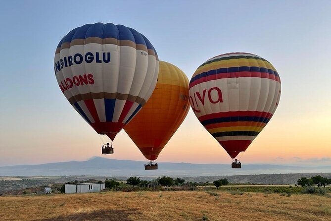 Cappadocia Hot Air Balloon Ride over Cat Valley with Transfers - Landing, champagne, and the certificate