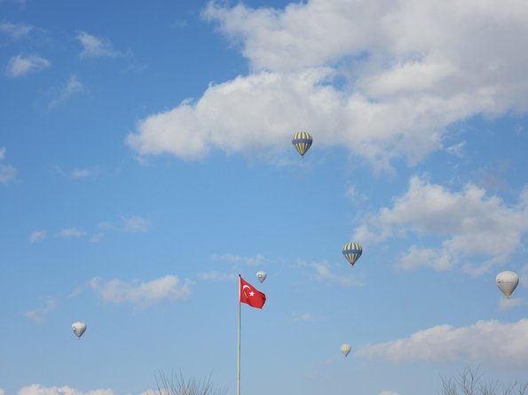 Cappadocia Hot Air Balloon Ride with Breakfast and Champagne - Red Valley at sunrise