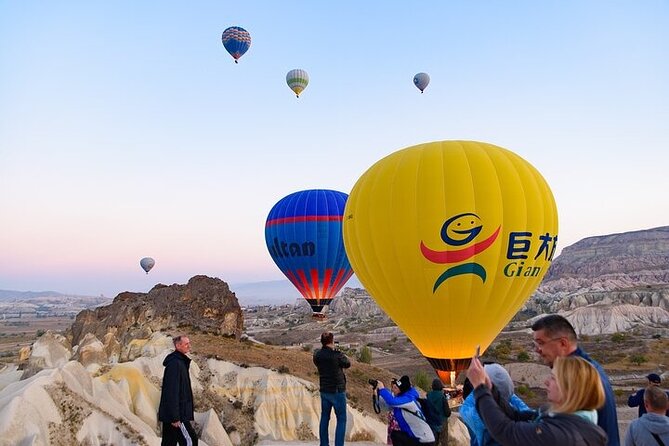 Cappadocia Sunrise Hot Air Balloon Watching Tour w/Transfer - The First Stop: Balloons Preparing for Lift-Off
