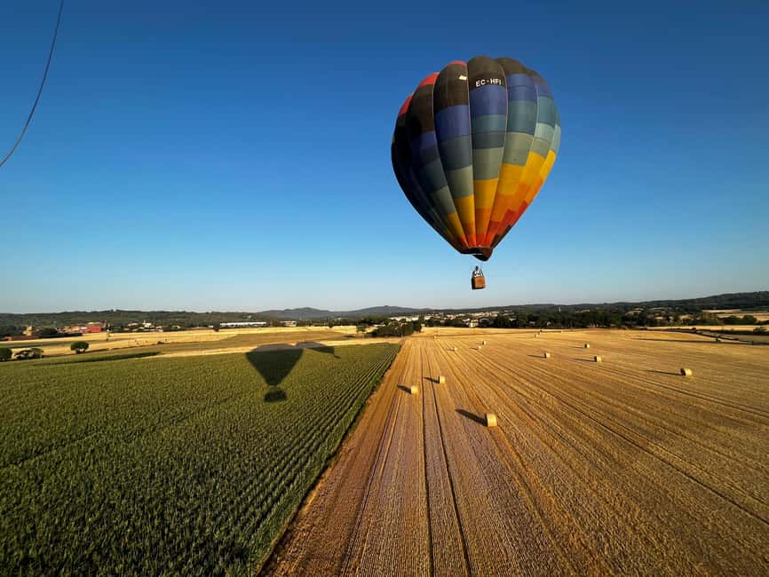 Costa Brava: Hot Air Balloon Flight - Shared - Landing, cava, and almond cake