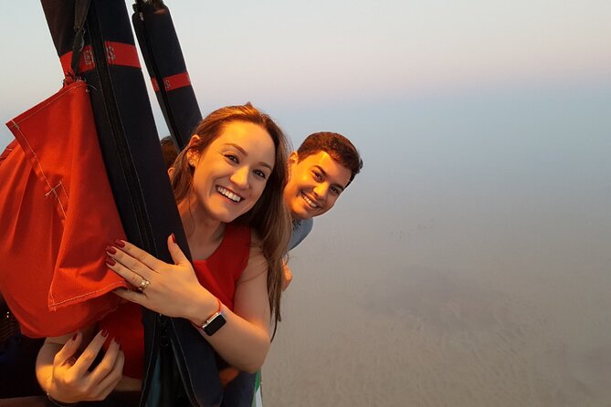 Dubai Desert By Hot Air Balloon With Falcon Show and Camel - Who will get the most from this morning?