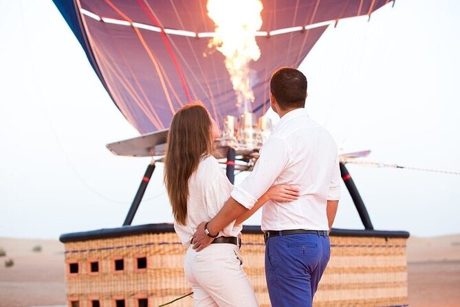 Dubai Hot Air Balloon Tour with Breakfast Camel Ride and Transfer - After landing, the desert keeps the morning moving