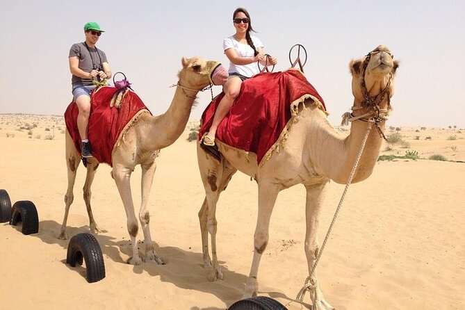 Hot Air Balloon Flight in Dubai with Breakfast, Falconry and Camel Ride - The desert looks different from the back of a camel