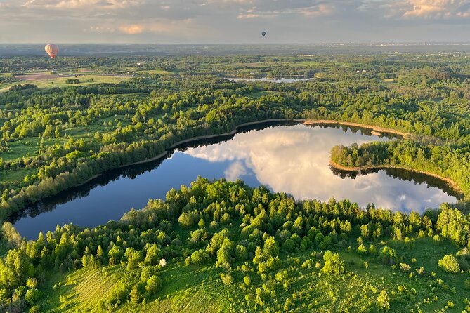 Hot air balloon flight over Vilnius or Trakai in Lithuania - The landing ceremony adds a human touch