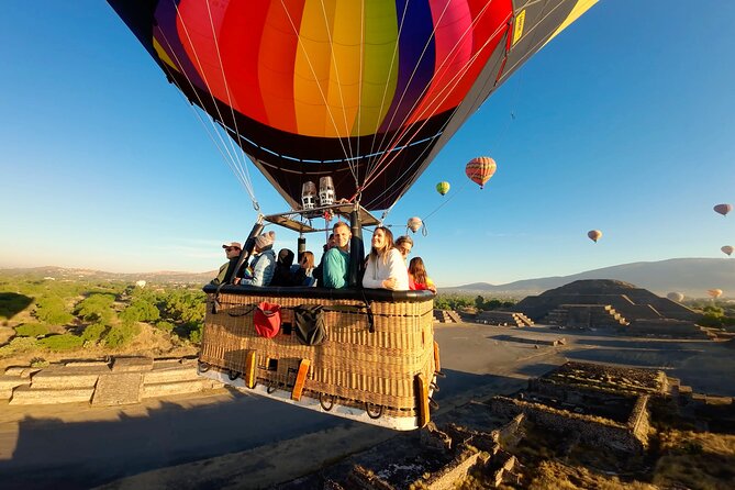 Hot Air Balloon Flight Teotihuacan With Pickup and Breakfast - A sunrise above Teotihuacan