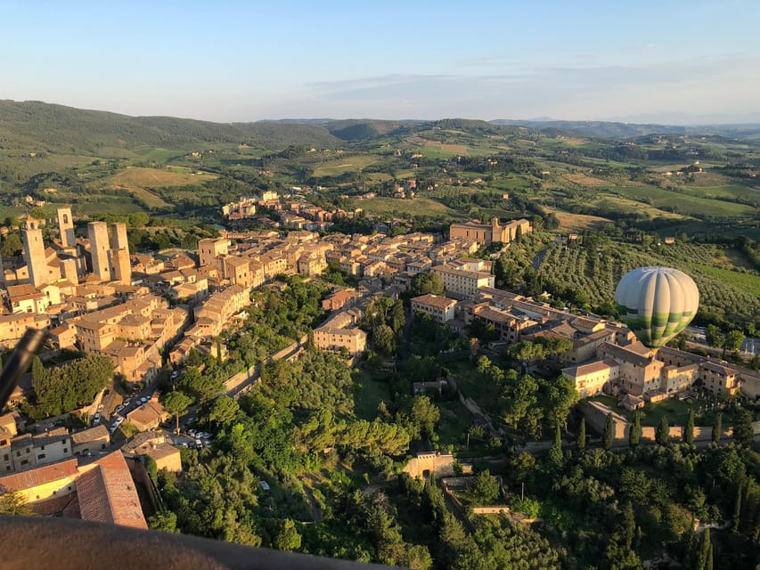 Hot Air Balloon Flights near San Gimignano - Landing, champagne, and the ride back