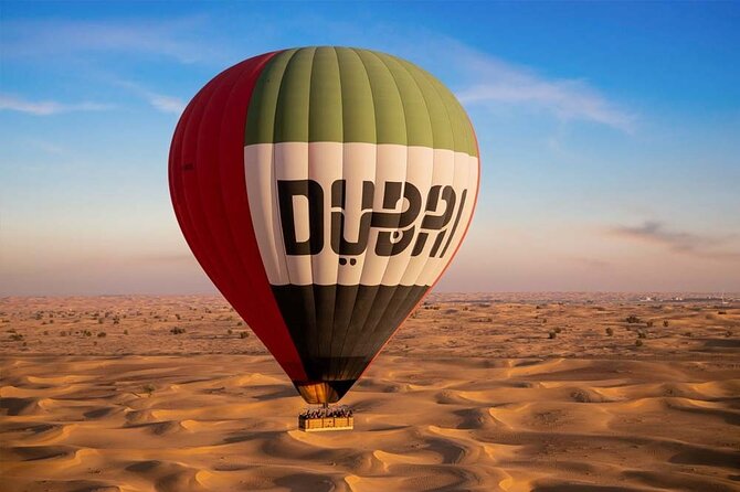 Hot Air Balloon Sunrise Tour with free transport in Dubai - Breakfast, camel riding, and the falcon photo