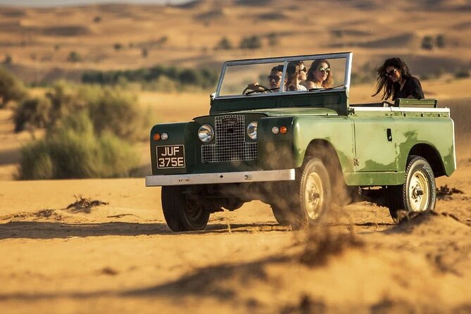 Hot air Balloon With 1957 Vintage Land Rover - Two very different views of the Dubai desert