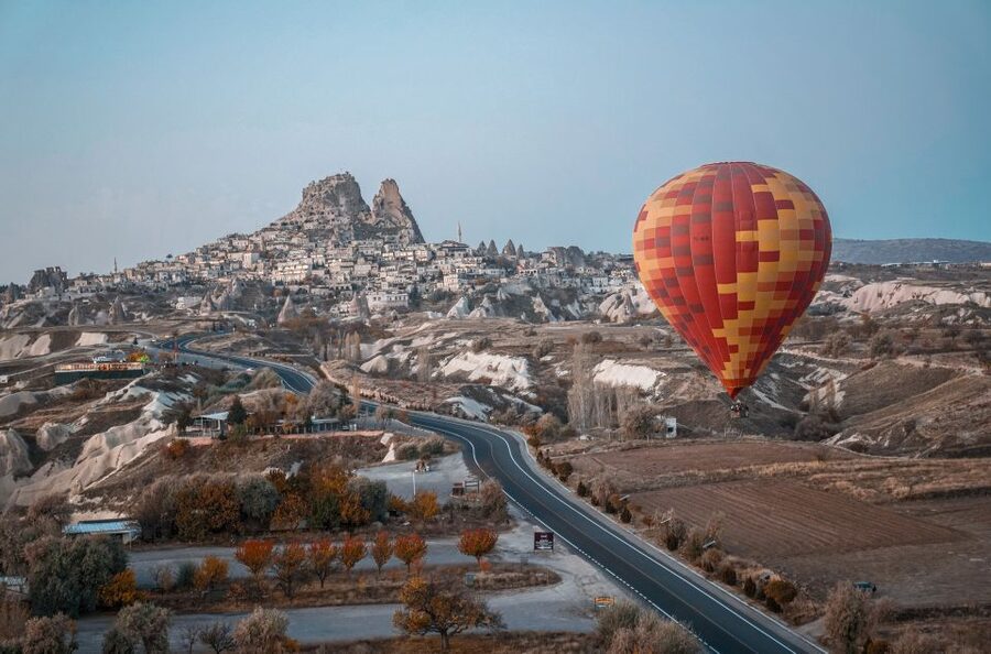 Hot air balloons in Goreme red valley - Red Valley at sunrise