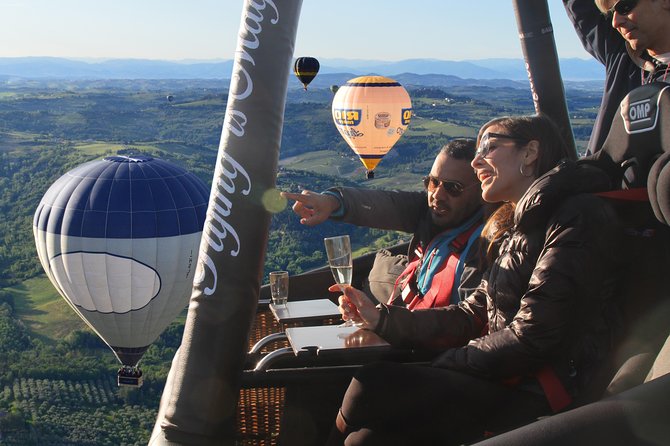 Luxury Balloon Tour in Tuscany - Helping prepare the balloon before takeoff