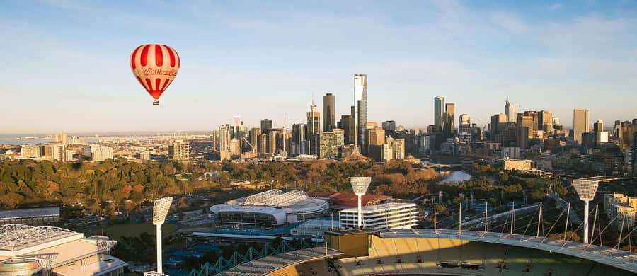 Melbourne Premium Balloon Flight 5-Star Champagne Breakfast - Sunrise over Melbourne from a wicker basket