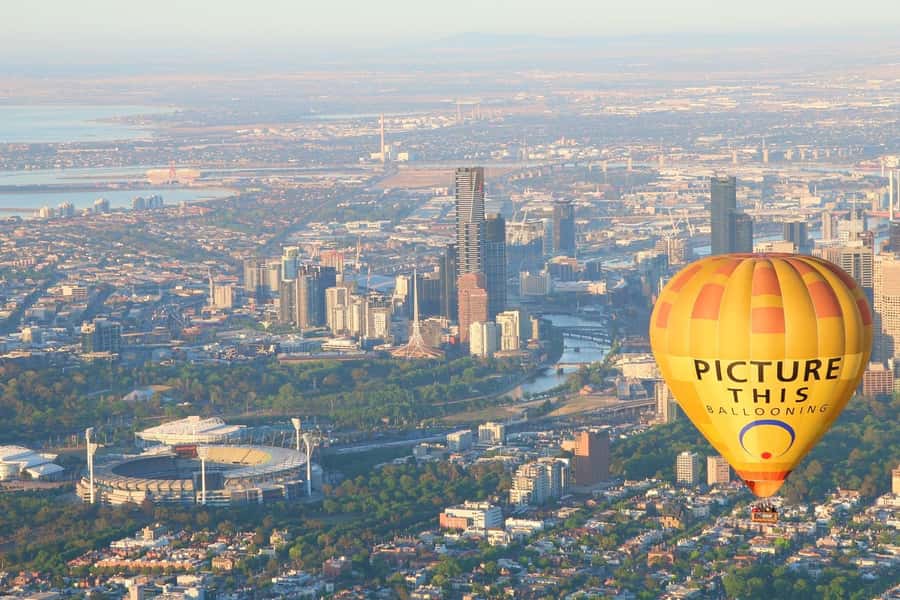 Melbourne: Sunrise Hot Air Balloon Experience with Breakfast - Melbourne at sunrise from a balloon basket