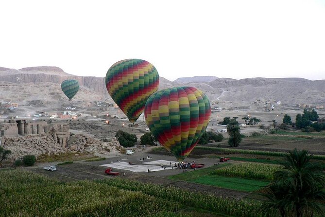 One Package Sunrise Hot Air Balloon Ride in Luxor and West Bank Private Tour - Crossing the Nile before sunrise