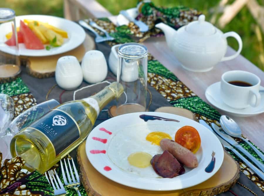 Serengeti: Hot Air Balloon Flight with Champagne Breakfast - Before sunrise, the Serengeti begins to move