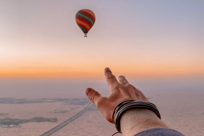Sunrise Hot Air Balloon Tour over Dubai Desert - Weather, cancellations, and practical timing