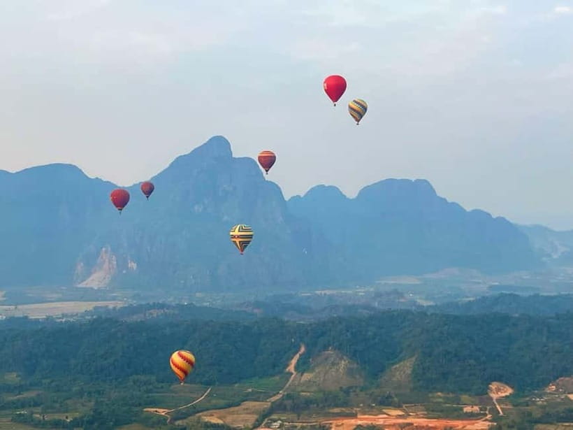 Vang Vieng: Hot Air Balloon Ride with City Hotel Pickup - The 30-minute tuk-tuk ride to the launch site